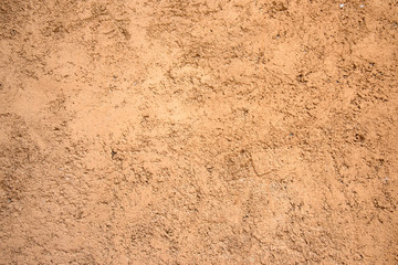 Close up clay wall for background or wallpaper, texture for decoration wall by vintage and retro style.