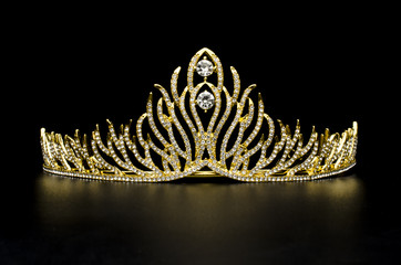 gold diadem with diamonds isolated on black - obrazy, fototapety, plakaty