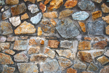 Close up masonry, stone from ancient architecture, texture, background or wallpaper