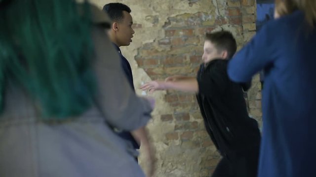 Boys fighting for girl, self-defense against school bullies, street violence