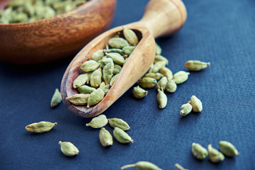 Super food cardamom health food selection in spoon.