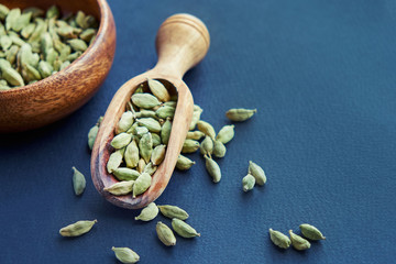 Super food cardamom health food selection in spoon.