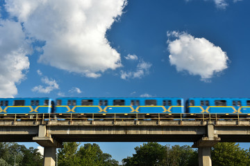 metro train on overpass in move