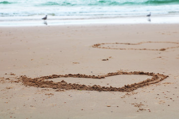 Hearts in the sand
