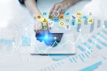 Colored applications icons and graphs on virtual screen. Business, internet and technology concept.