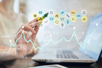 Colored applications icons and graphs on virtual screen. Business, internet and technology concept.