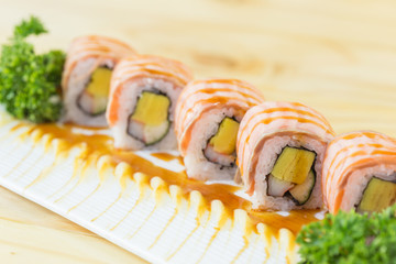 grilled salmon sushi roll - japanese food	