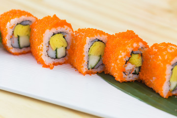Traditional fresh japanese sushi rolls isolated on white background. Top view	