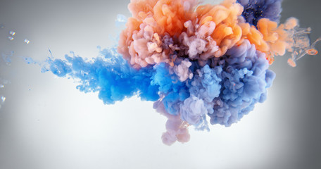 Fototapeta premium colors and ink splash in water