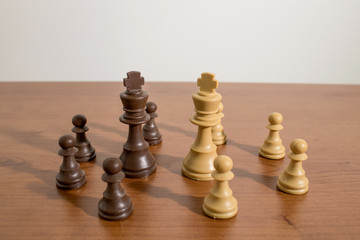 Chess, king pieces on a decorated wood table