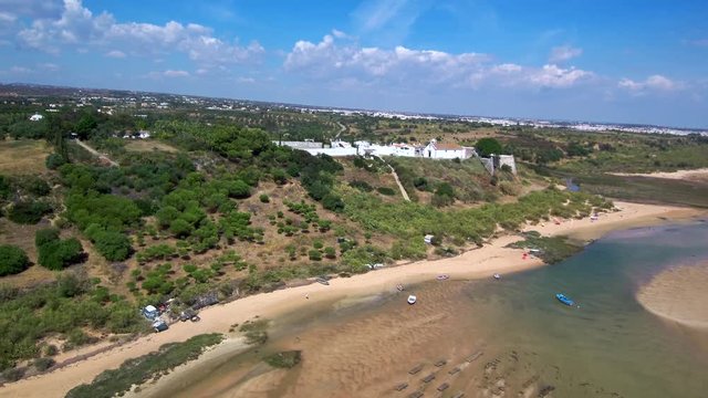 Portugal. Aerial view in Cacela Velha, coastal village in Algarve. 4k Drone Video