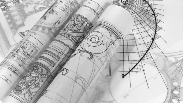 rolls of blueprints - drawing of the golden section and drawings of antique decorative elements of architectural orders / seamless looping