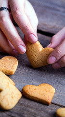 hands holding a gingerbread