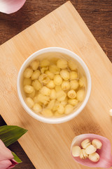 Vietnamese food, sweet lotus seed gruel, ingredients: lotus bean, sugar candy. this Vietnam dish for dessert or snack, very delicious, tasty, nutrition, make sleep well