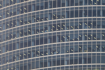 Obraz premium Translucent stained-glass windows of the modern apartment skyscraper building