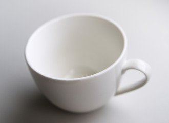 a cup of coffee on white background