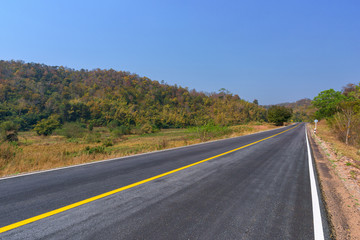 Asphalt road side view and landscape countryside.