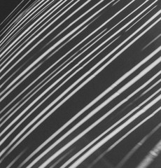 Shadow pattern on white cloth