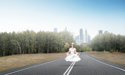 Young woman keeping mind conscious.