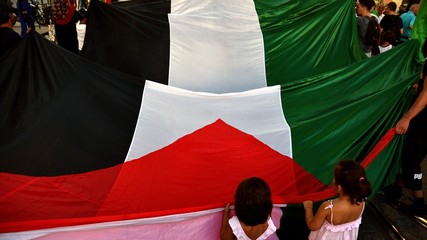 Big Palestinian flag during in a demonstration