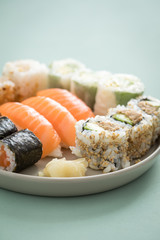Salmon and tuna sushi mix plate with Nigiri, Maki and inside out California rolls 