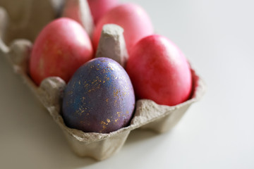 Colorful pastel Easter eggs with gold