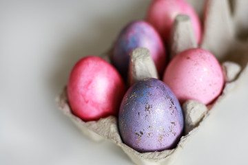 Colorful pastel Easter eggs with gold