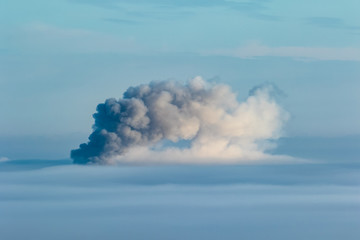 Smoke above the clouds