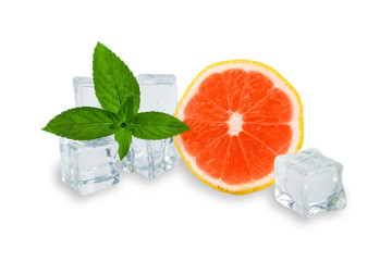 ice cubes with a sprig of mint and half a grapefruit