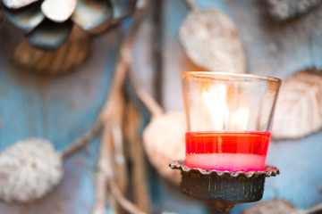 Colorful Candles light for funeral candles burning at night. Abstract candles background. Golden light of candle flame with vintage retro tone.