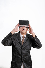 Asian Businessman wearing virtual reality on white background