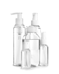 Different cosmetic bottles on white background