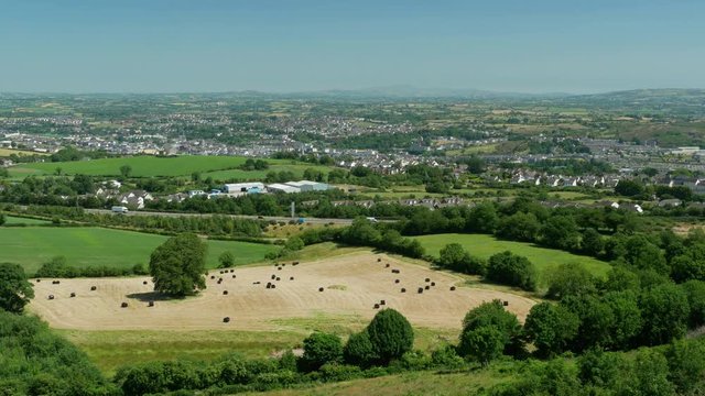 Distant view of the main A1 / N1 cross border road outside of Newry in the UK (Northern Ireland) and close to the Irish border crossing point. Features local countryside in foreground.