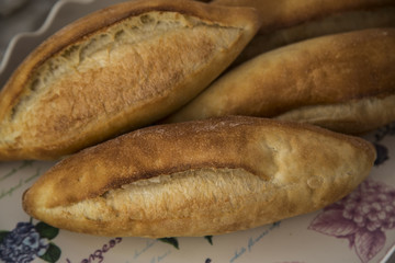 loaf of white bread on a table. concept for restaurant and cafe
