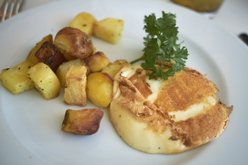 Grilled scamorza cheese and roasted potatoes