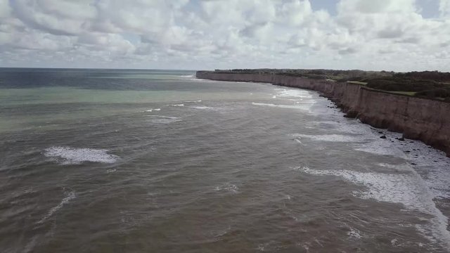 Cliffs at Acantilados near Mar del Plata Argentina– 4k drone video of the Argentinian coast Mar del Plata Casino Central in spring.  Buenos Aires Capital Federal district  