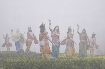 hindu god krishna dancing in rains