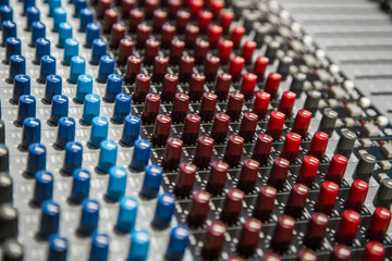 Close-up of the knobs of the mixing console