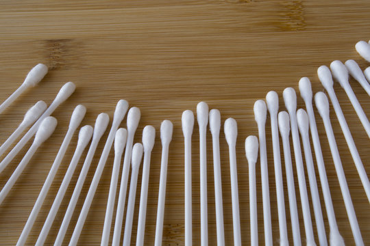 Cotton bud wood stick or cotton swab on background
