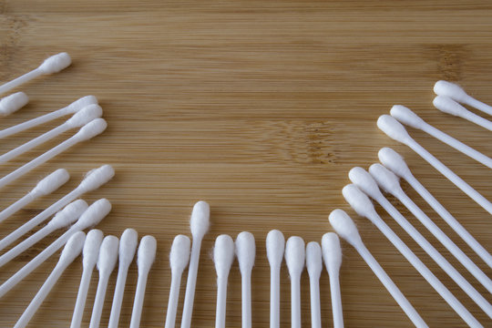 Cotton bud wood stick or cotton swabs on background