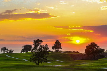 sunset over golf course