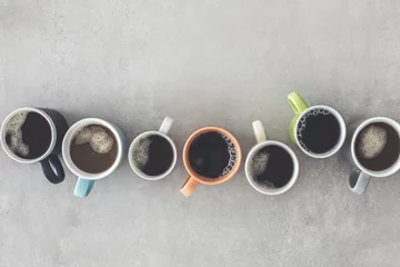 Türaufkleber Many cups of coffee on table © sebra
