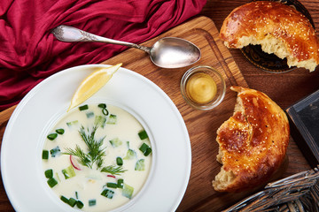a white plate with okroshka