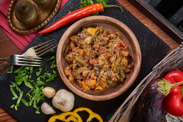 plate with vegetable stew on a tray