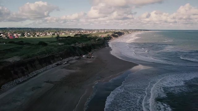 Cliffs at Acantilados near Mar del Plata Argentina– 4k drone video of the Argentinian coast Mar del Plata Casino Central in spring.  Buenos Aires Capital Federal district  
