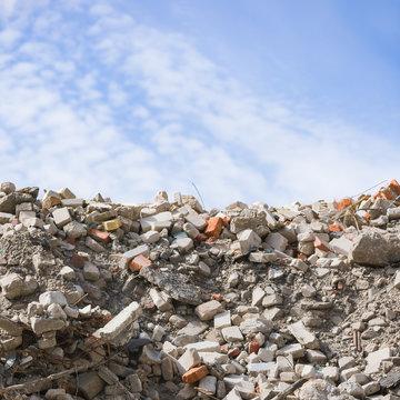 Closeup of earthquake caused the house to collapse, there were many broken bricks and cement.
