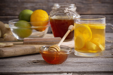  Ginger tea and ingredients on a  grunge wooden background