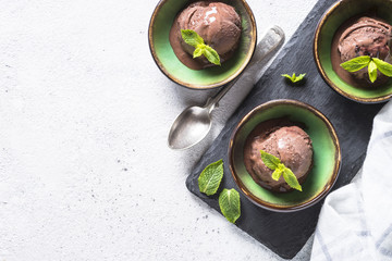 Chocolate ice cream top view on white.