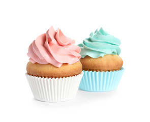 Delicious birthday cupcakes on white background