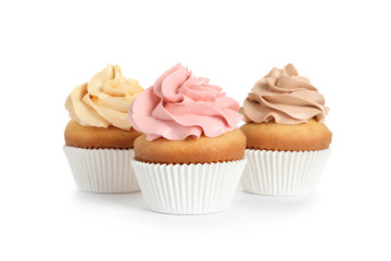 Delicious birthday cupcakes on white background